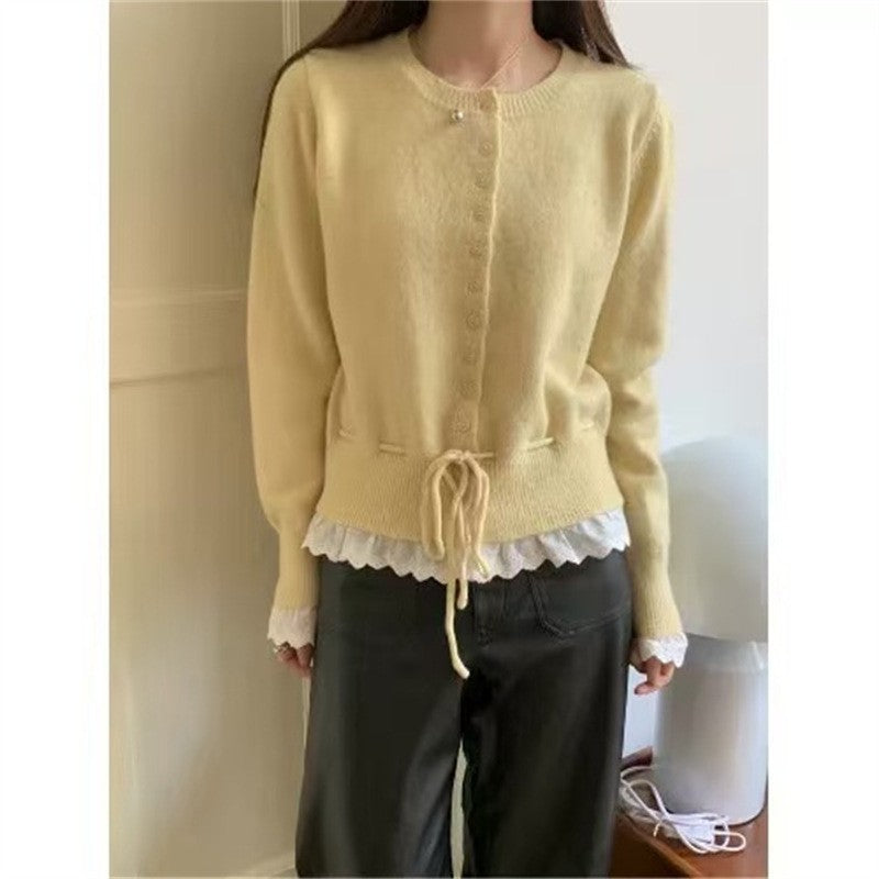 Damen kuscheliger Strickjacke mit fransigen Details und Bändchen EB