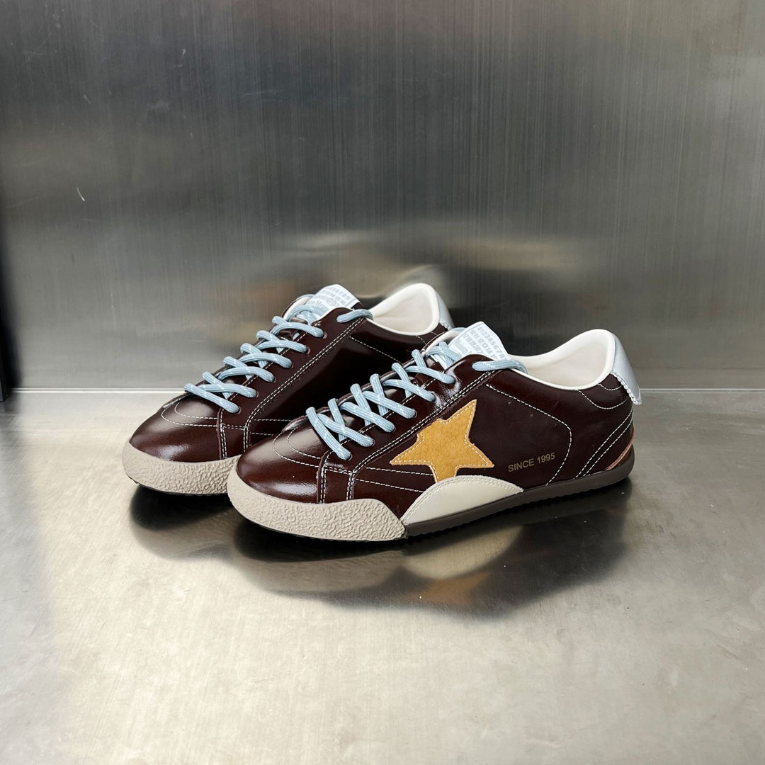 Damen Sneakers im sportlich-eleganten Design mit auffälligem Sternmotiv EB