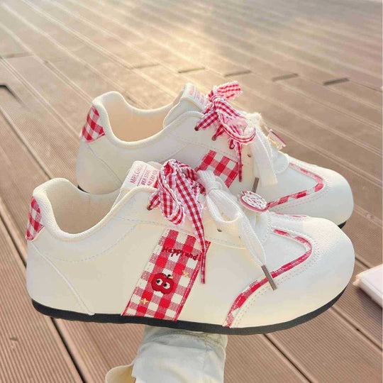 Damen Sneakers mit verspieltem Karomuster und dekorativen Schleifen EB