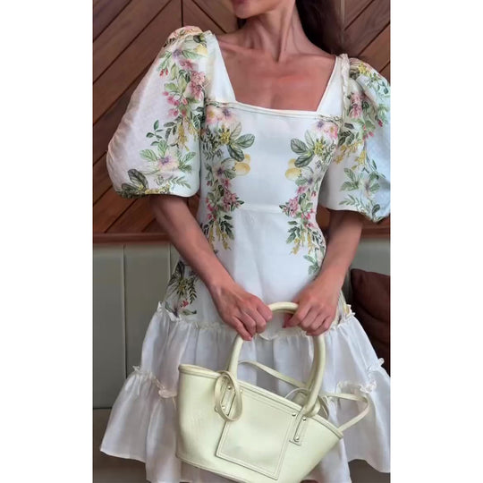 Damen Blumenkleid mit voluminösen Puffärmeln und fließendem Rock EB