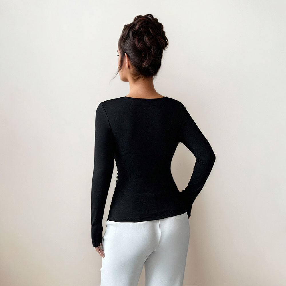 Damen figurbetontes Langarmshirt mit asymmetrischem Ausschnitt und dekorativer Brosche Eichborn Berlin