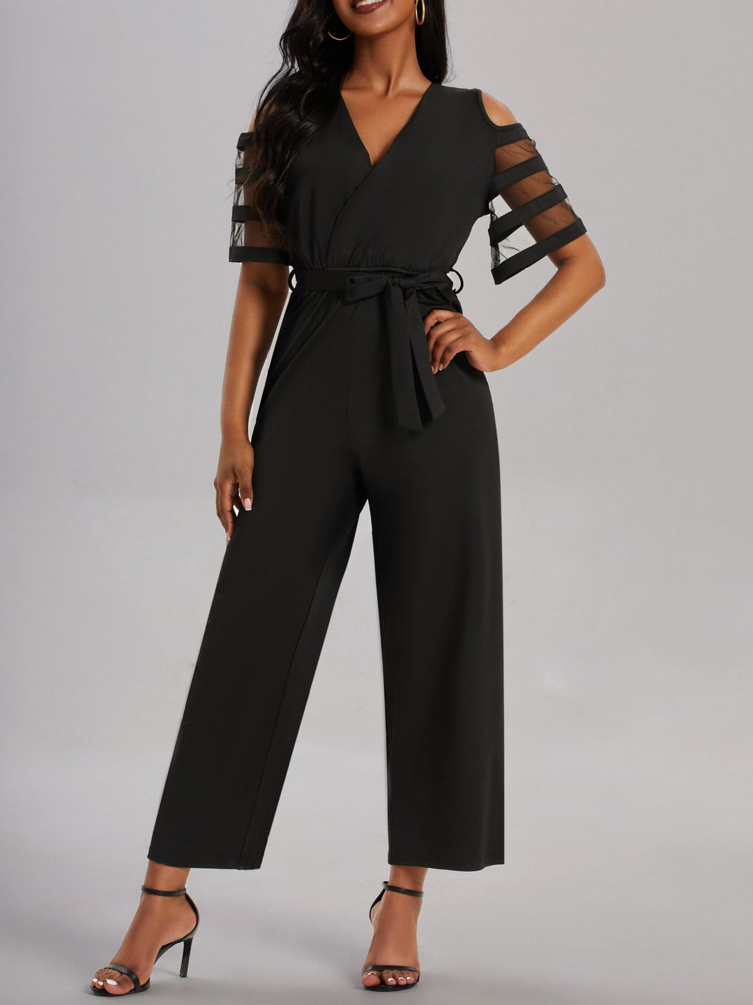 Damen Eleganter Jumpsuit mit transparenten Ärmel-Details und Taillengürtel EB