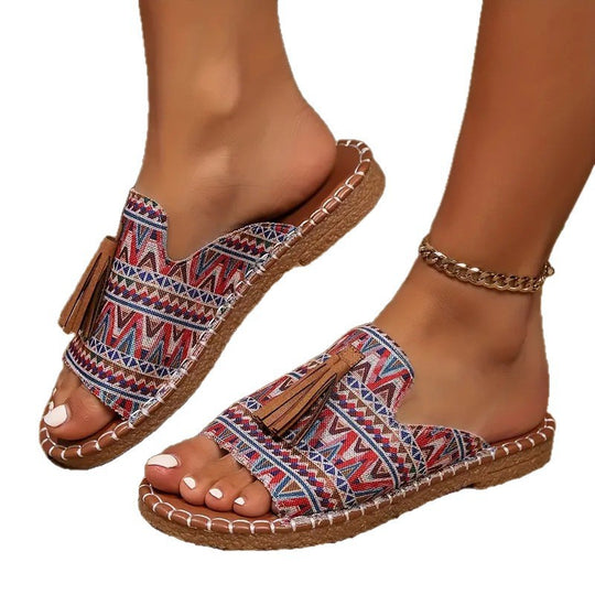 Damen Ethno-Slipper-Sandalen mit Quaste und handgenähter Ziernaht EB