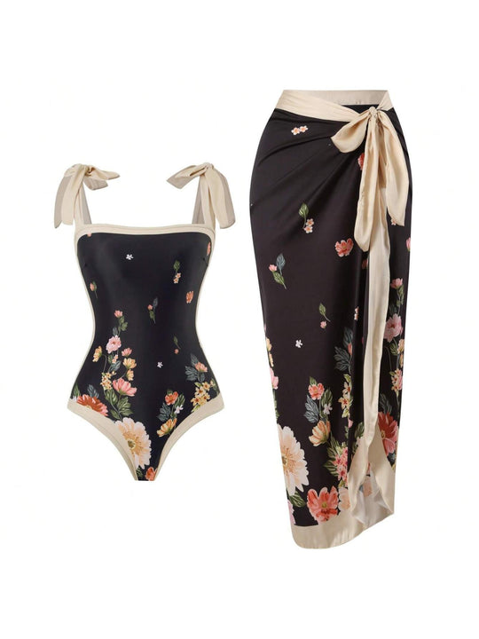 Damen Eleganter Badesuit mit floralen Akzenten und modischem Wickelrock EB