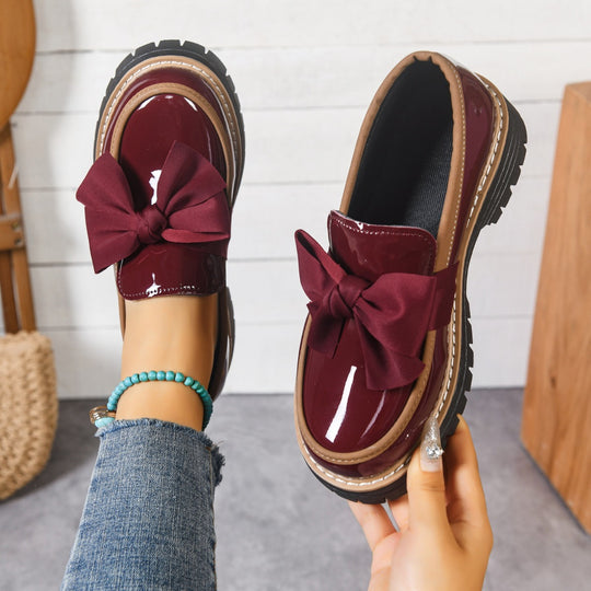 Damen  Lack-Loafer mit großer Zierschleife und profilierter Gummisohle EB