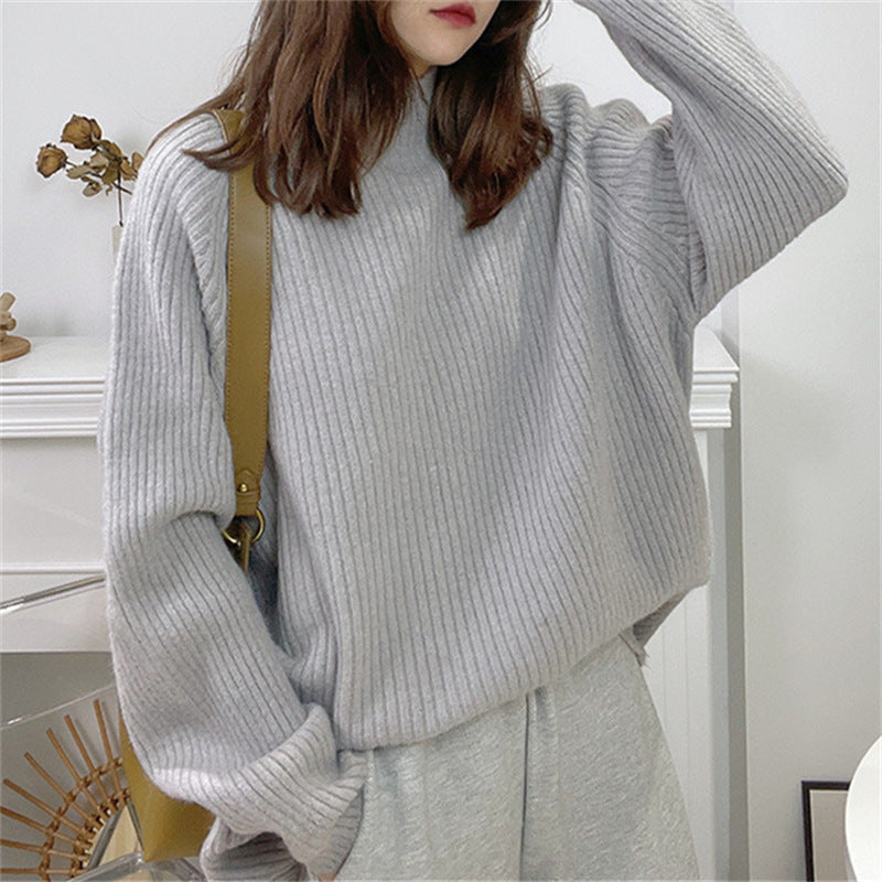 Damen Oversized Strickpullover mit hohem Kragen und feiner Rippstruktur EB