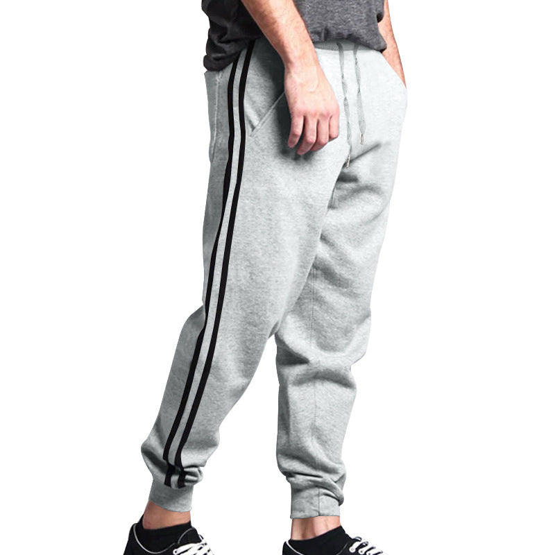 Herren Relaxed-Fit Jogginghose mit seitlichem Kontraststreifen, Elastikbund & Kordelzug EB