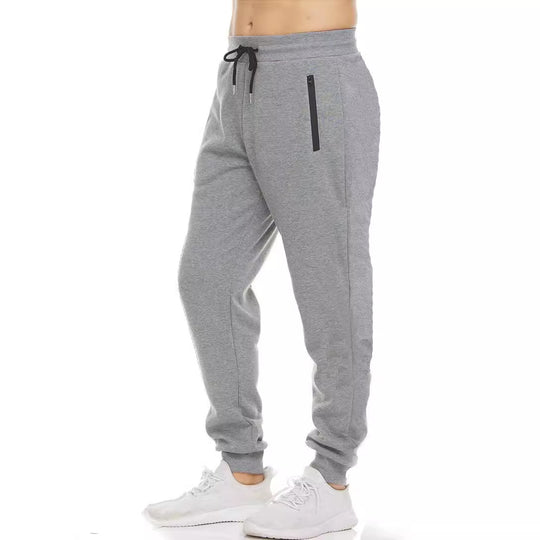 Damen nan tapered Jogginghose mit elastischem Komfortbund, wasserabweisender Reißverschlusstasche und geripptem Knöchelabschluss EB
