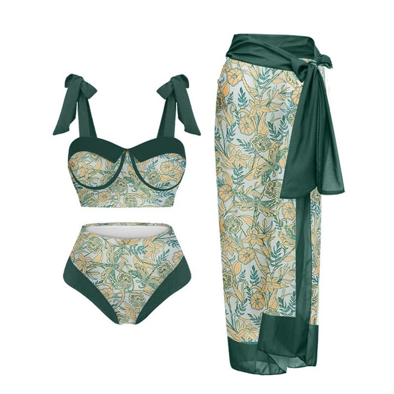 Damen Einteiler Badeanzug mit elegantem Wickelrock und modischen Riemen EB