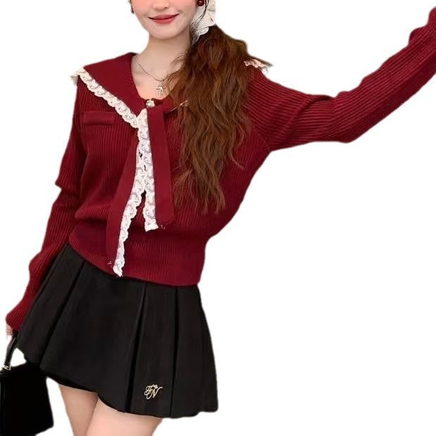 Damen Strickjacke mit Rüschen-Halsband und dekorativen Knöpfen EB