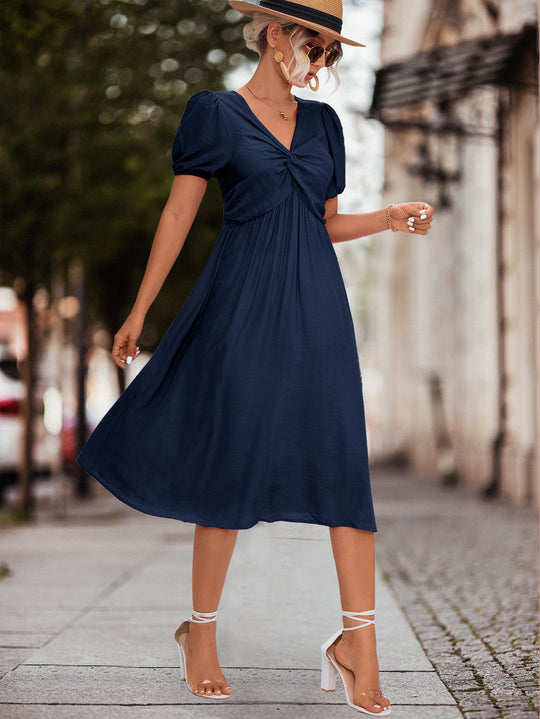 Damen Midikleid mit eleganter Raffung und voluminösen Puffärmeln EB