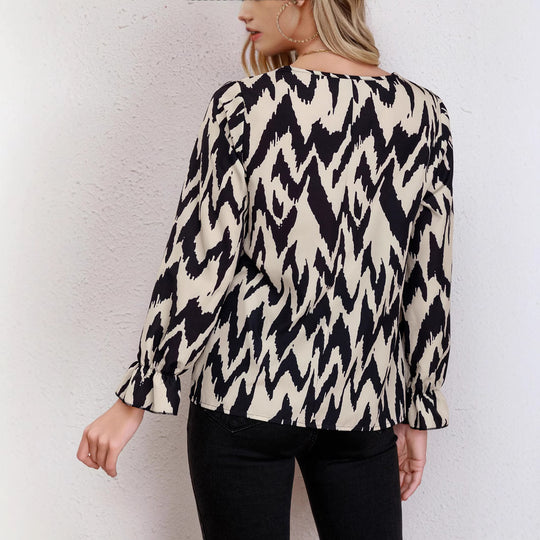Damen Bluse mit modernem Zickzackmuster und eleganten Ballonärmeln EB