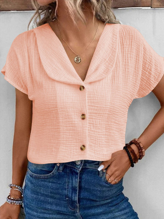 Damen Blusenshirt mit stilvollem Schalkragen und dekorativen Knopfdetails EB