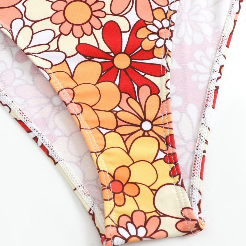 Damen Langarm-Badeanzug mit floralem Design und herausziehbarem Reißverschluss EB