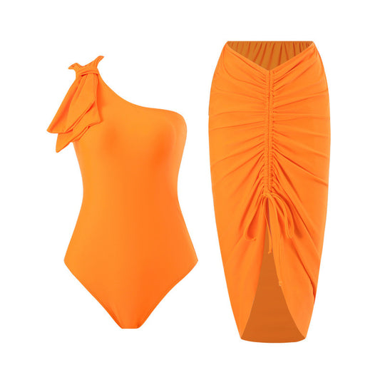 Damen Einteiler Badeanzug mit asymmetrischem Schnitt und modischem Wickelrock EB