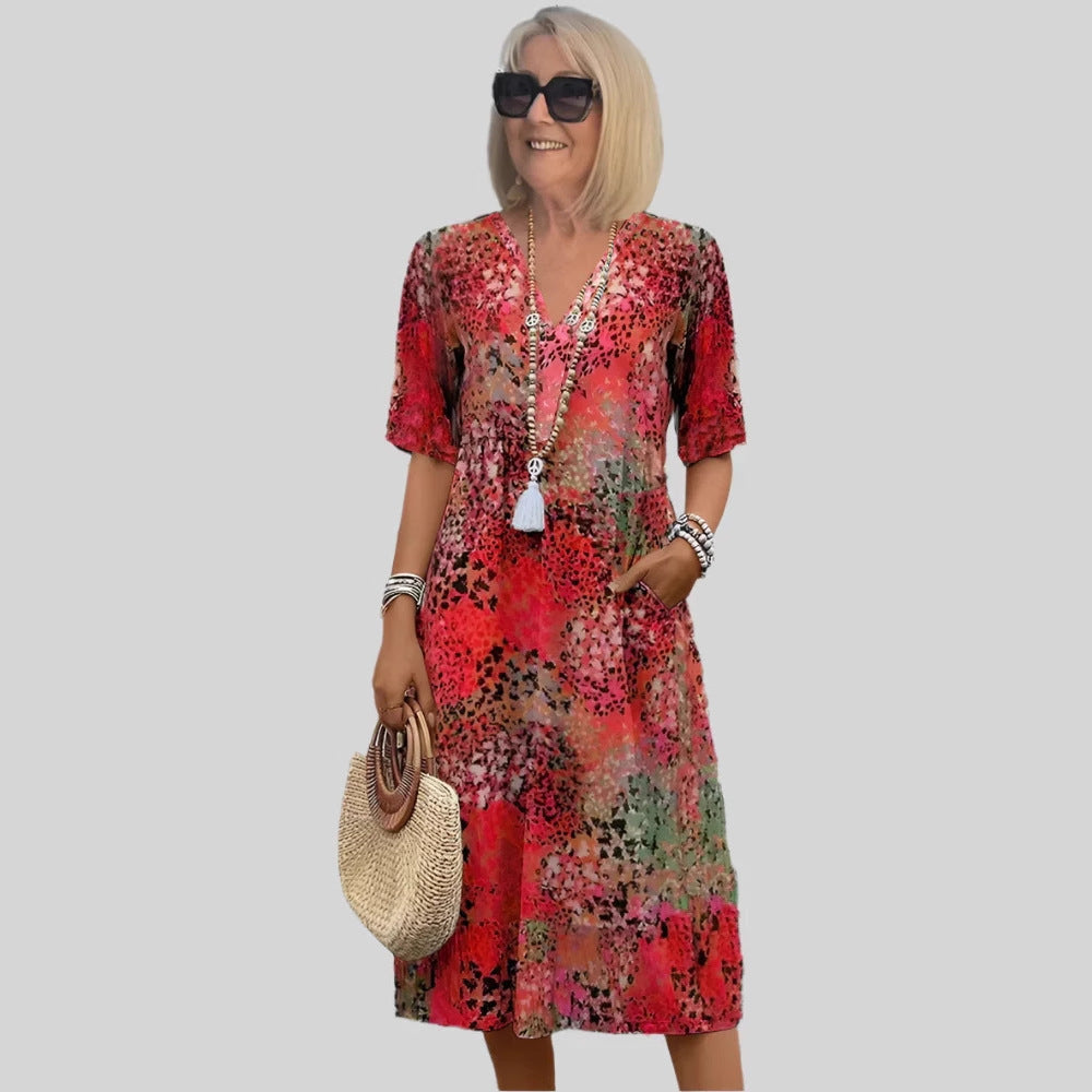 Damen Sommerliches Maxikleid mit floralem Design und praktischen Taschen EB