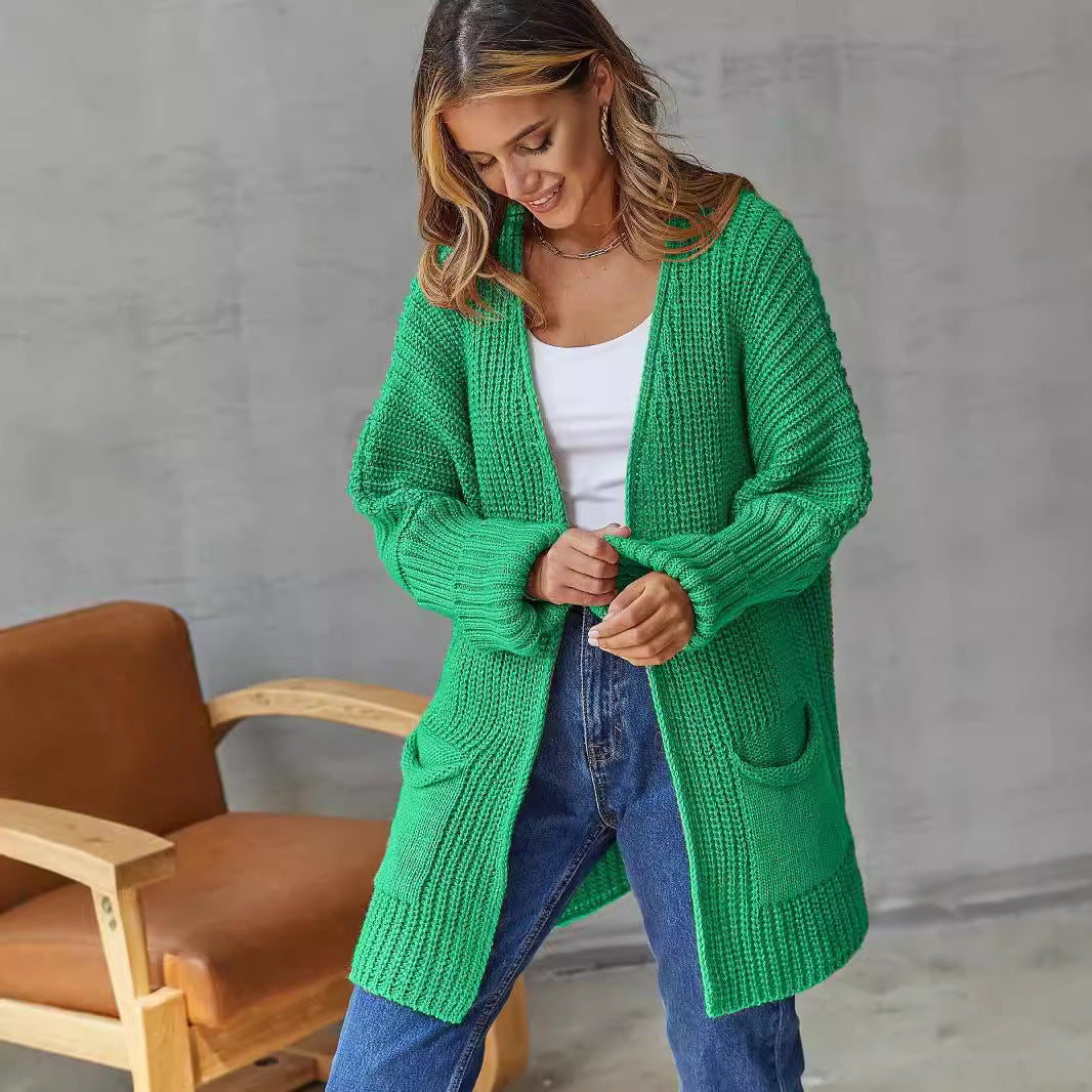 Damen Grobstrickjacke mit tiefem V-Ausschnitt und praktischen Taschen EB