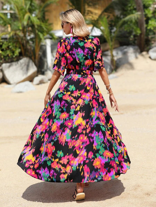 Damen Maxikleid mit asymmetrischem Saum und floralem Print EB