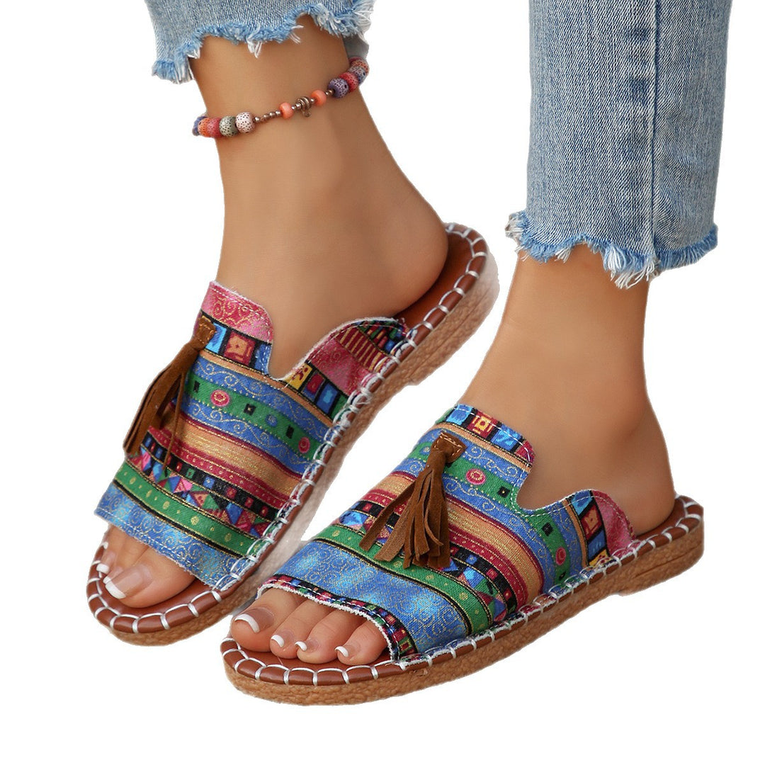 Damen Lifestyle Pantoletten mit verspieltem Tassel-Design und buntem Webmuster EB