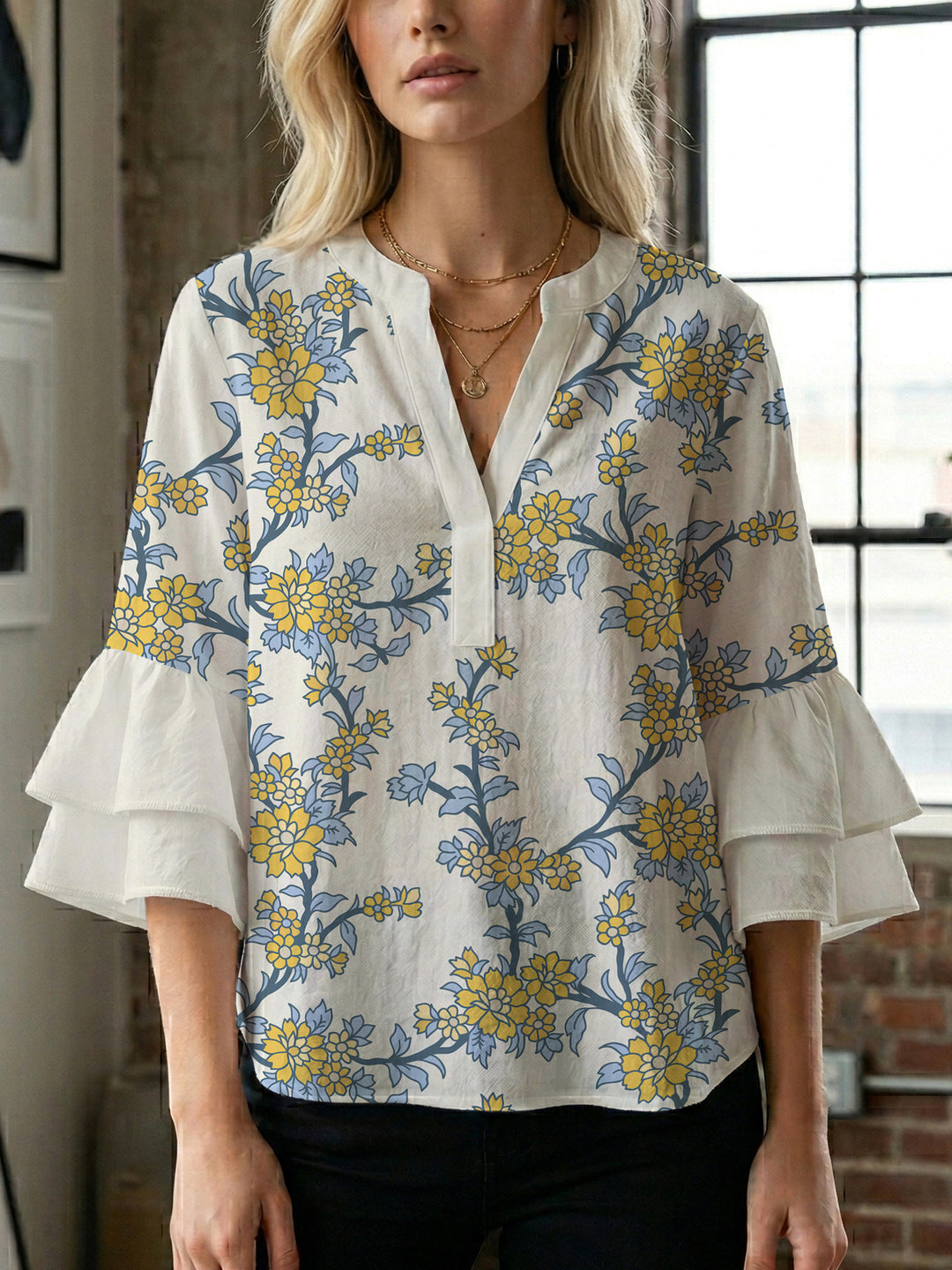 Damen Bluse mit voluminösen Ärmeln und floralem Design EB