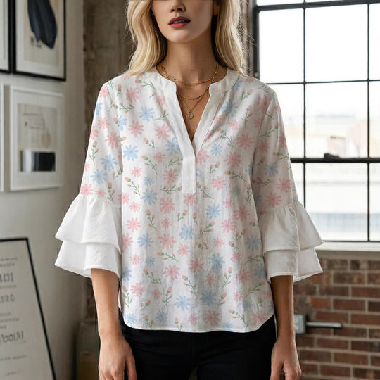 Damen Bluse mit voluminösen Flügelärmel und intensivem Blattmuster EB