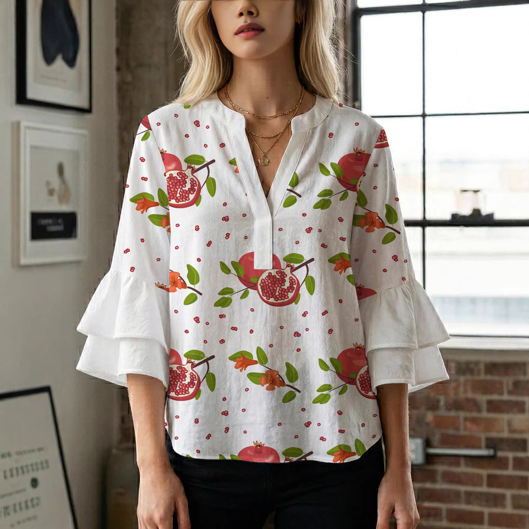 Damen Bluse mit voluminösen Rüschenärmeln und modernem Motiv EB