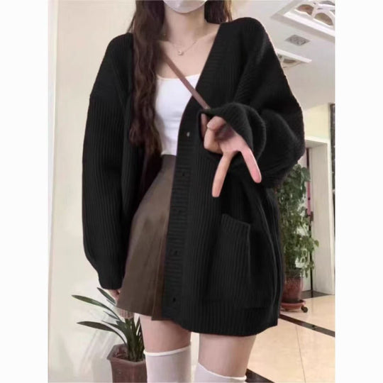 Damen Grobstrickjacke mit großen Taschen und Knopfdetails EB