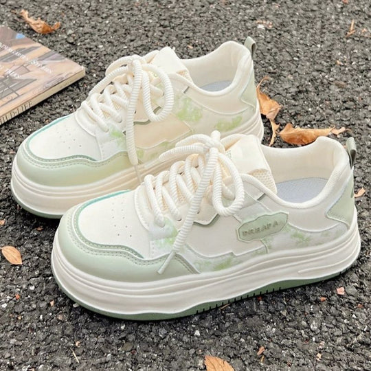 Damen Voluminöser Plateau‑Sneaker im Retro‑Citystil mit dezenter Marmorierung und dämpfender Keilsohle EB