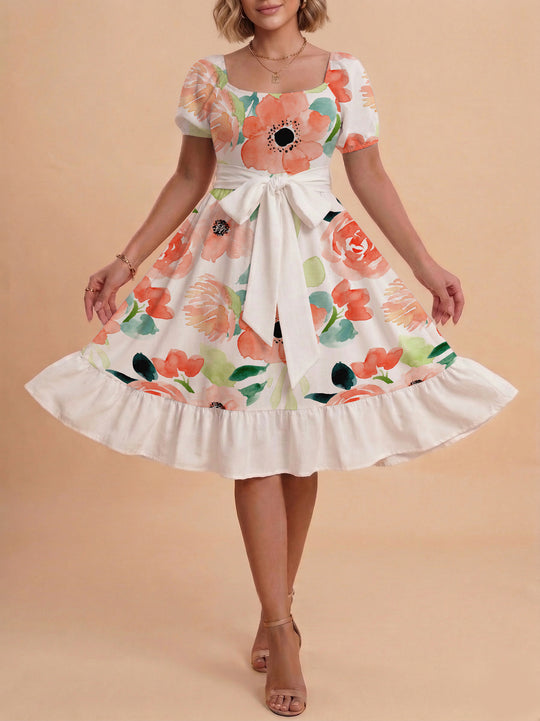 Damen Sommerliches Blumenkleid mit taillierbarem Gürtel und voluminösen Ärmeln EB