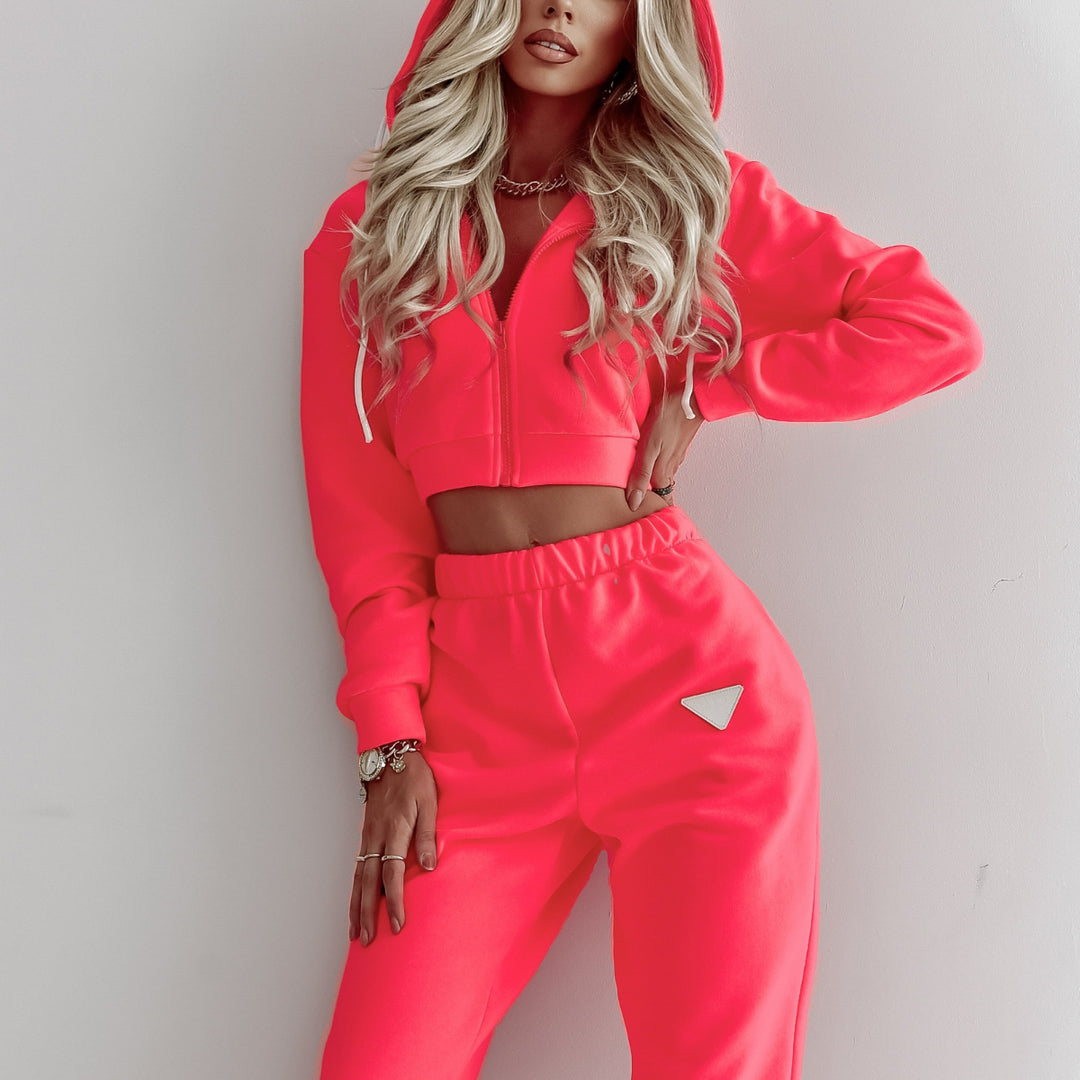 Damen kurzes Kapuzen-Sweatshirt mit Reißverschluss und hochgeschnittene Jogginghose Set Eichborn Berlin