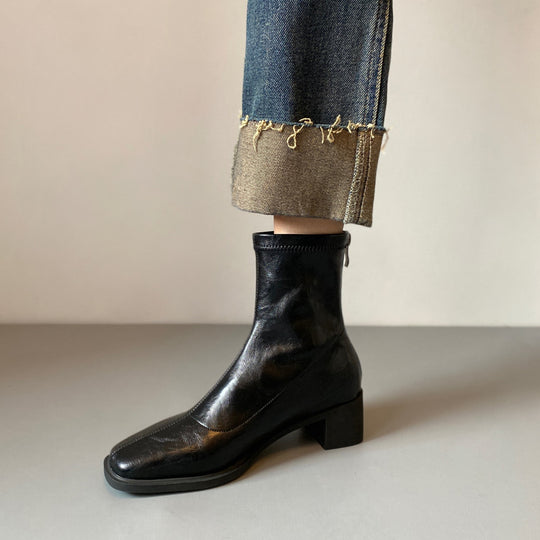 Damen Stiefeletten mit hohem Blockabsatz und eleganter Silhouette EB