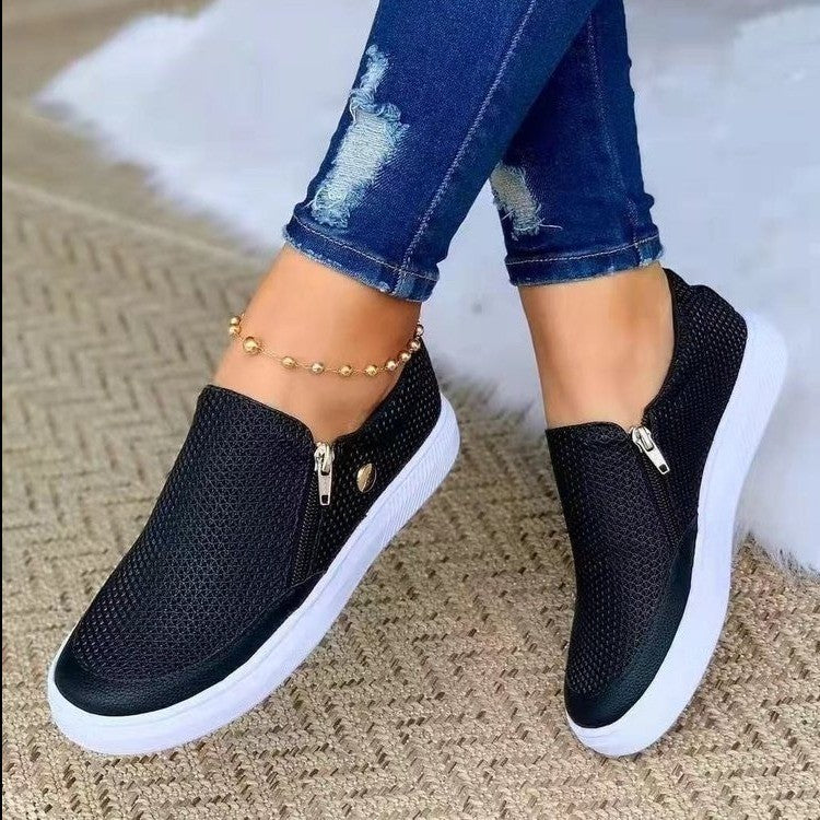 Damen Slip-On Sneakers mit seitlichem Reißverschluss und atmungsaktiver Textur EB