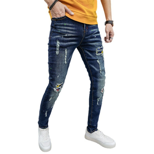Herren Skinny Fit Jeans mit kreativen Farbklecksen und Rissdesign EB