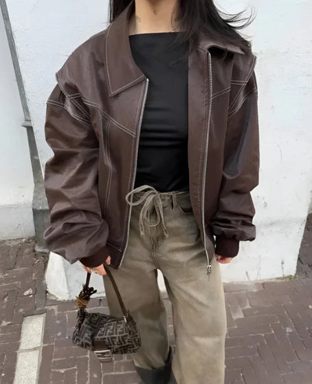 Damen Elegante Kunstlederjacke mit hochstehendem Kragen und elastischen Bündchen EB