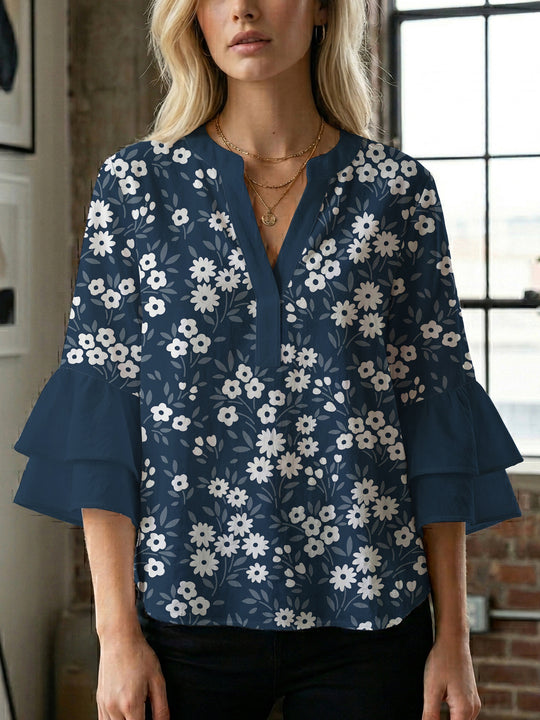 Damen Bluse mit voluminösen Ärmeln und floralem Design EB