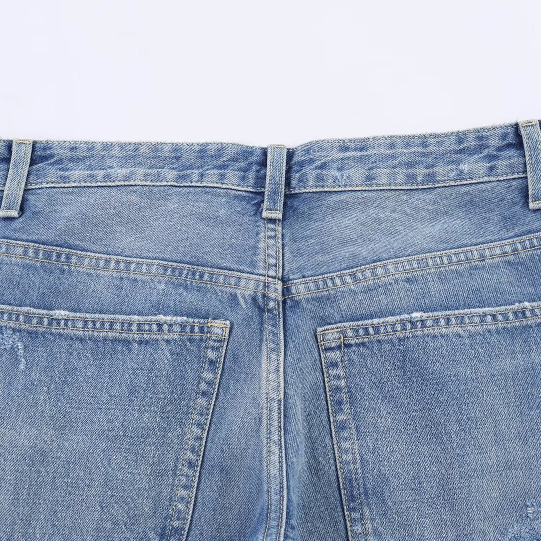 Damen Flared Jeans mit Destroyed-Effekten und Fransenabschlüssen EB