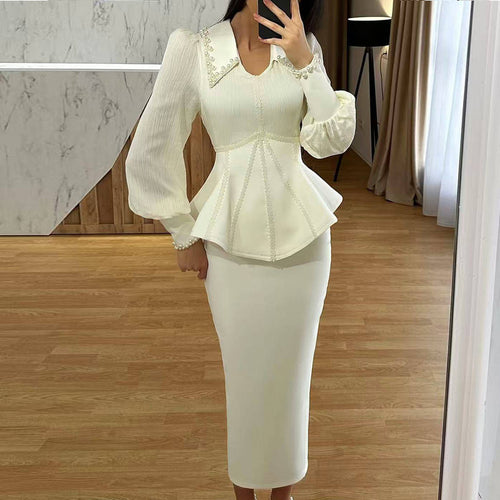 Damen Elegante Bluse im außergewöhnlichen Peplum-Stil mit romantischen Details EB