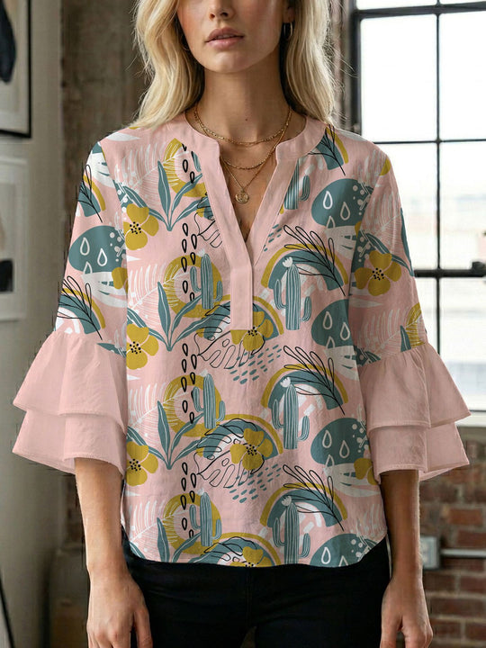 Damen Blusenshirt mit voluminösen Ärmeln und kreativem Druckdesign EB