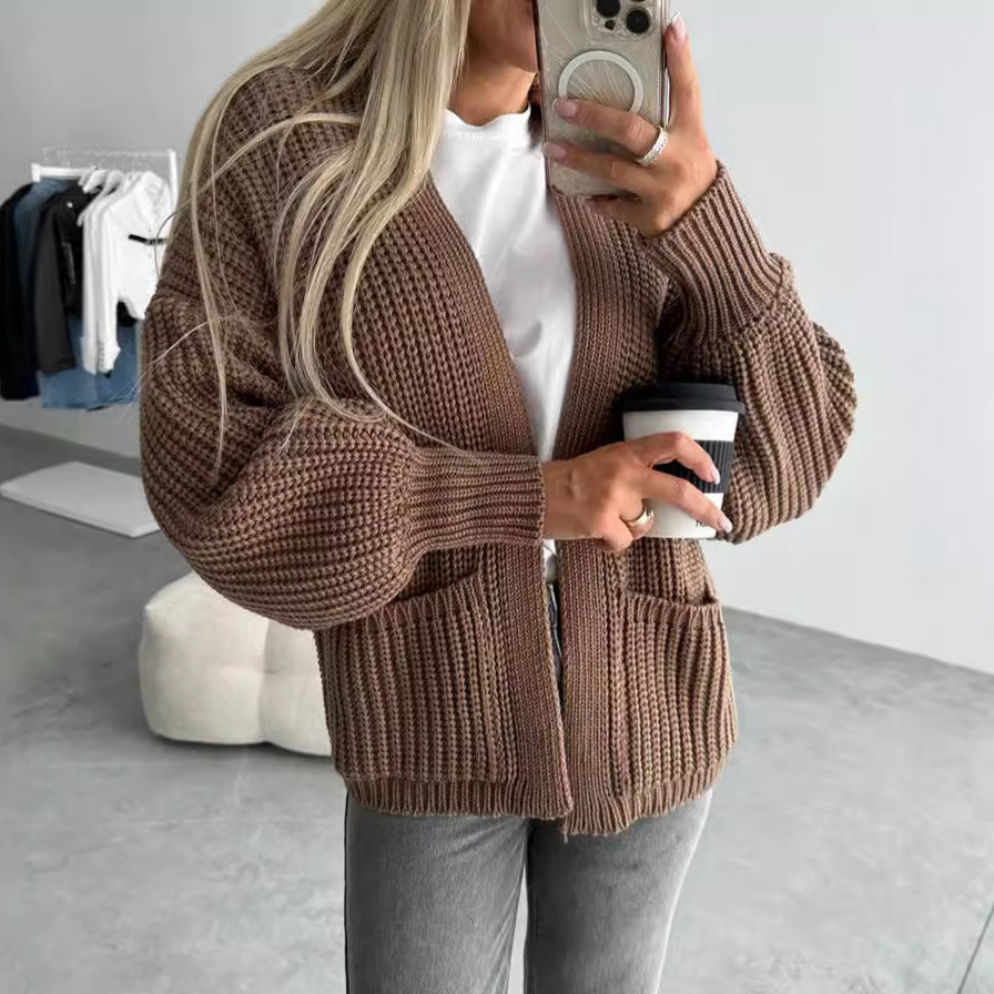 Damen Strickjacke mit strukturierter Oberfläche und voluminösen Ärmeln EB