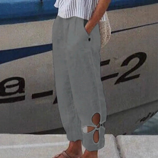 Damen nan knöchellange Culottehose mit elastischem Bund, Eingrifftaschen und floraler Saumaussparung EB