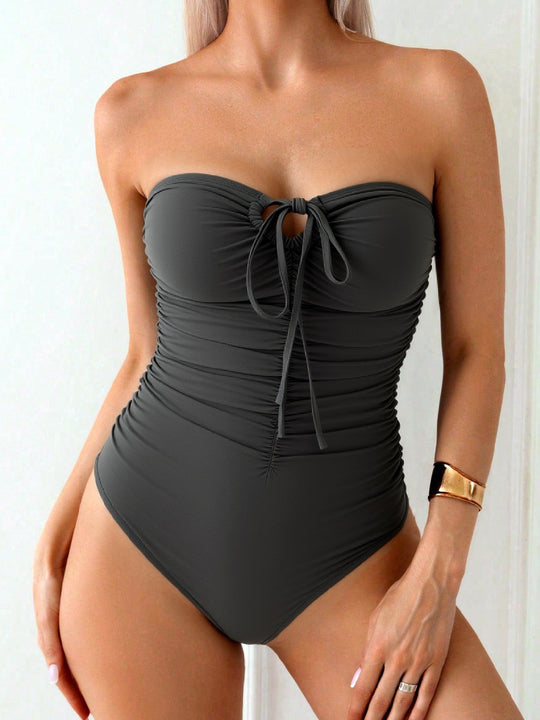 Damen Bandeau-Badeanzug mit Raffung und modischem Schlitz EB