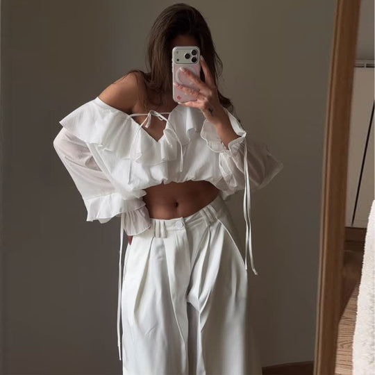 Damen Bluse mit voluminösen Rüschendetails und Kapitänsärmeln EB