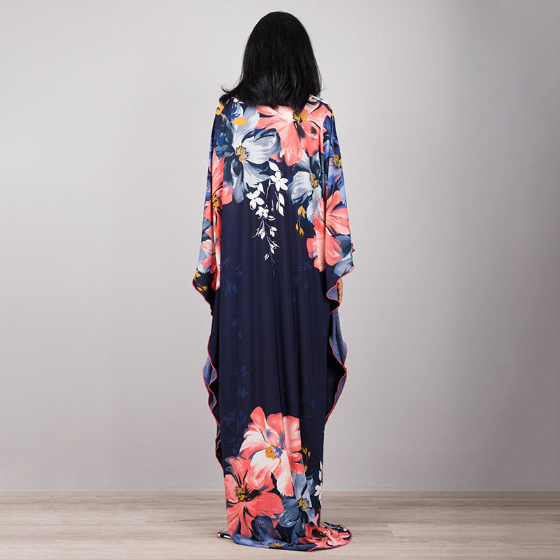 Damen Maxikleid mit kunstvollem Pfauenmuster und seitlichen Schlitzen Heidi Mode