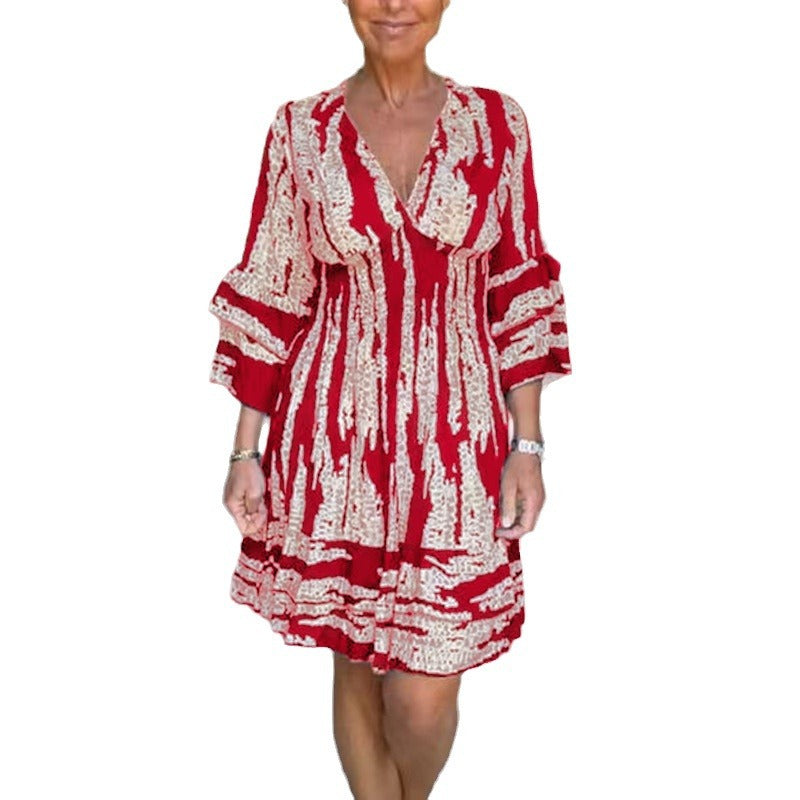 Damen Wickelkleid mit voluminösen Ärmeln und dekorativem Muster EB
