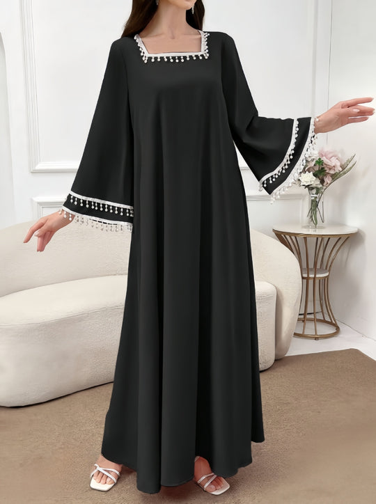 Damen Elegantes Maxikleid mit dekorativen Fransen und weiten Ärmeln EB