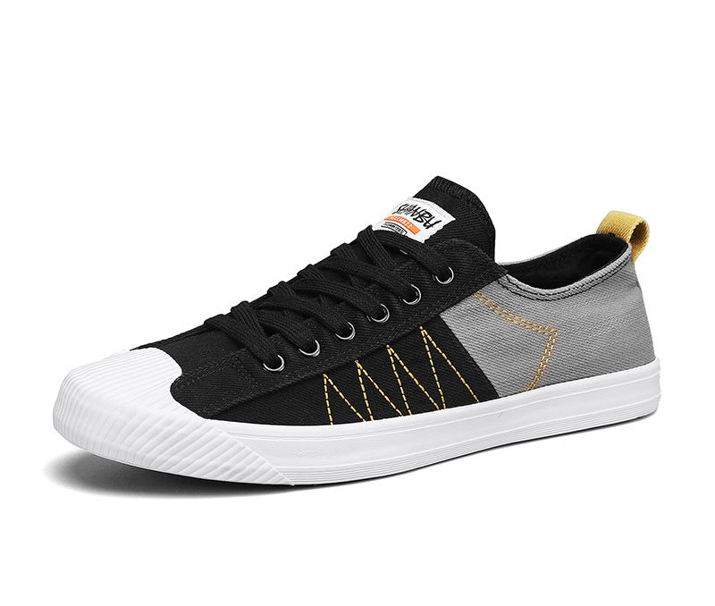 Unisex niedrige Canvas-Sneaker mit verstärkter Gummi-Zehenkappe und kontrastierenden Textilpaneelen EB