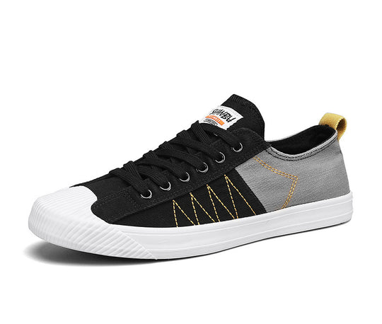 Unisex niedrige Canvas-Sneaker mit verstärkter Gummi-Zehenkappe und kontrastierenden Textilpaneelen EB
