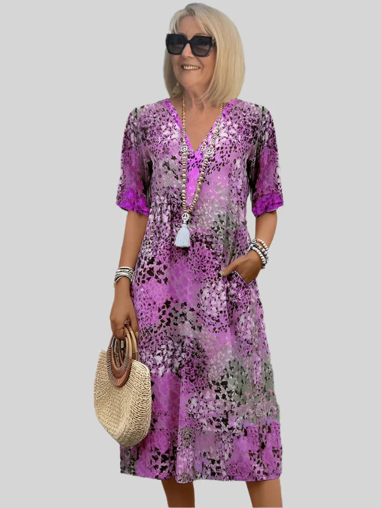 Damen Sommerliches Maxikleid mit floralem Design und praktischen Taschen EB