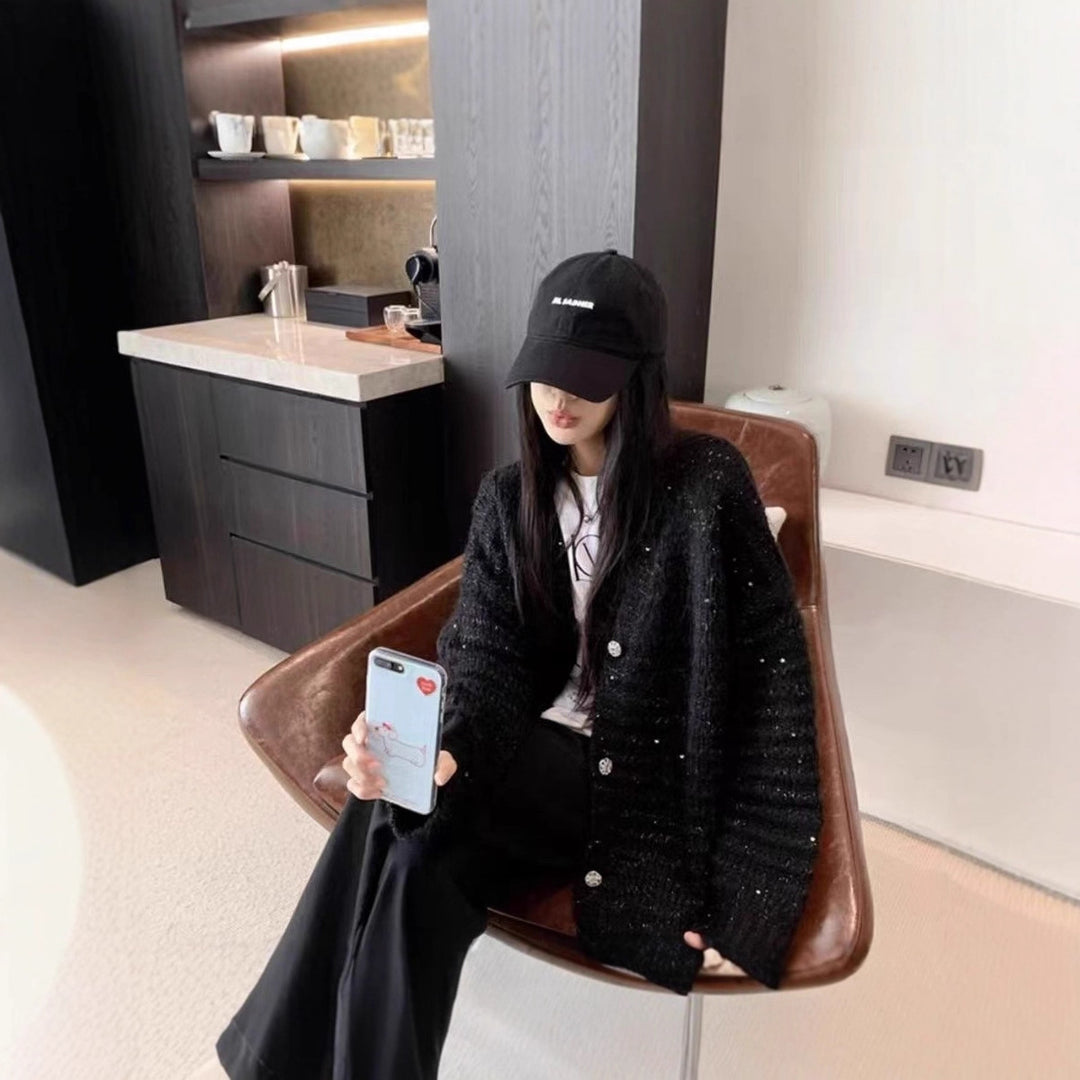 Damen Strickjacke mit voluminösen Ärmeln und einzigartiger Maschenstruktur EB