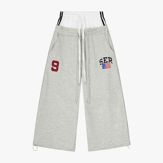 Damen Modische Sweathose mit weitem Schnitt und Sportstreifen EB